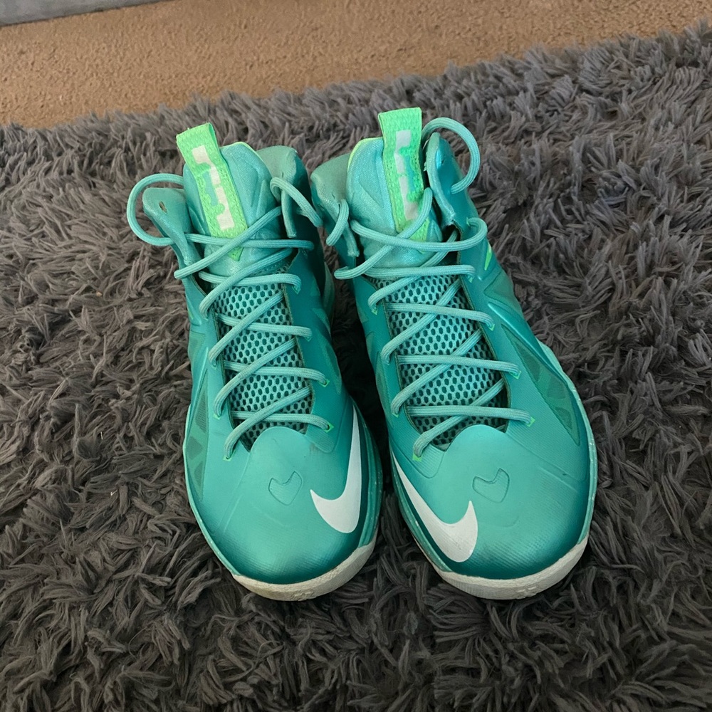White and teal LeBron sneakers